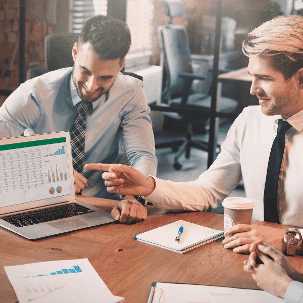 Business professionals analyzing data and charts